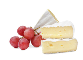 Tasty cut brie cheese with grapes on white background