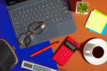 Items for business on bright colors in the office on the table 