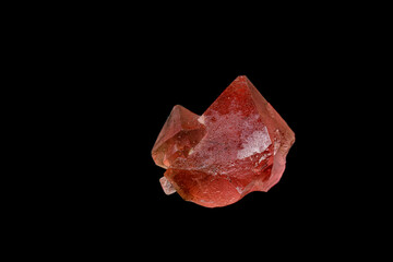macro mineral stone pink fluorite on a black background