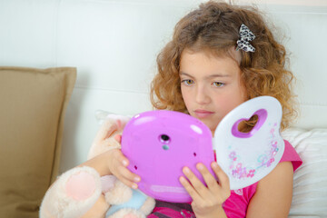 a female child is playing