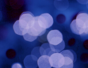 Abstract bokeh background of blue garlands.