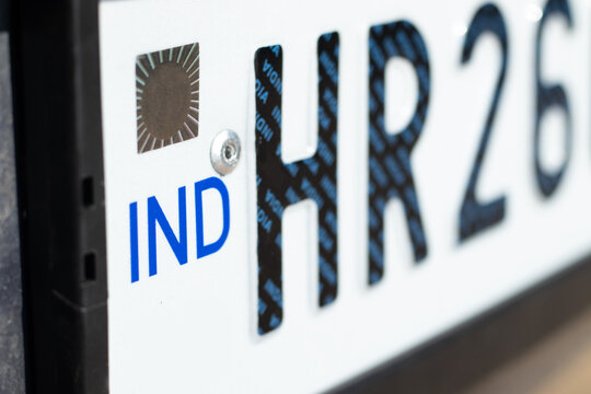 High Security Number Plate With Ashoka Chakra Chromium Hologram IND Sign Is Electronically Linked To Indian Vehicle. HSRP Has Laser Brand Permanent Identification For Protection Against Counterfeiting