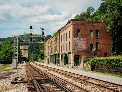 Railroad tracks and historic buildings in Thurmond, a ghost town in the New River Gorge of West Virginia