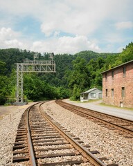 Fototapeta na wymiar Railroad tracks and historic buildings in Thurmond, a ghost town in the New River Gorge of West Virginia