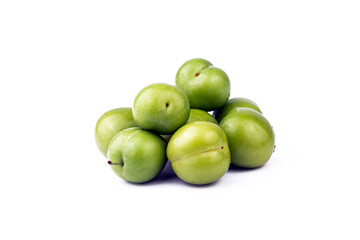Ripe green plum on white isolated background.