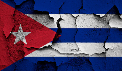 Flag of Cuba on old grunge wall in background 