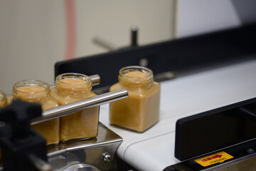 Obraz na płótnie Canvas honey packaging line