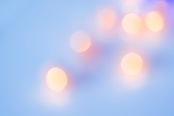 golden pink bokeh at light purple background