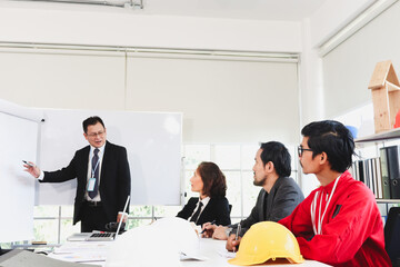 Achievement successful senior businessman shares experience success and gives presentation at conference meeting, business people and engineer have discussion about building construction plan project.