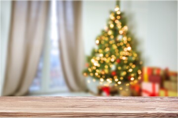 Table space in front of defocused Christmas tree