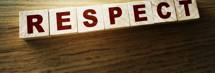 Respect word written on wood block. respect text on table, Business ethics concept