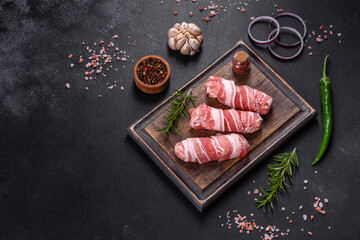 Fototapeta na wymiar A delicious dish of pork mince wrapped with delicious pieces of bacon