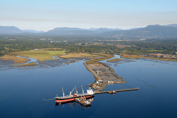 Freighter Indigo Ocean at the Western Forest Products terminal with the Cowichan Valley in the...