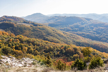 Fototapeta na wymiar Autumn Landscape of Erul mountain near Kamenititsa peak, Bulgaria