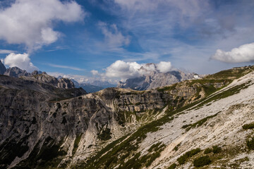 Clouds over mountain trail Tre Cime di Lavaredo in Dolomites in Italy