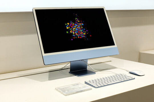 Apple iMac in Apple store. Editorial illusrative photo of new Apple 24-inch iMac (M1 chip)