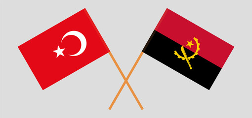Crossed flags of Turkey and Angola. Official colors. Correct proportion