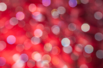 Dark red blurred background with bokeh hexagonal
