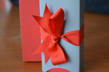 red gift box on wooden background