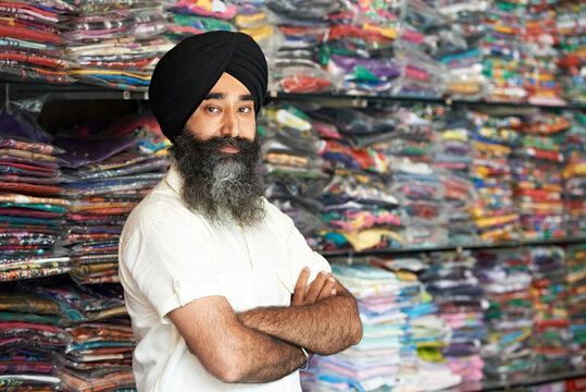 Young adult indian sikh seller man