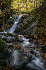 Lush beautiful waterfall during autumn