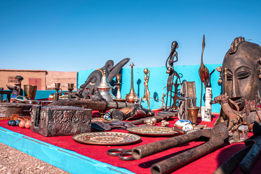Collection of decorative iron or metallic handicrafts and figurines for sale in flea market