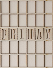 the word "friday" (day of the week) in wooden stencil font on textured ivory paper