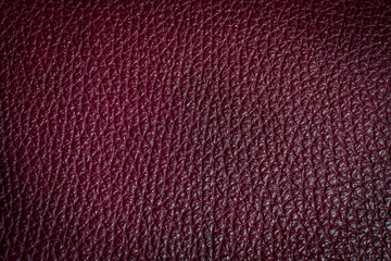 genuine leather of burgundy color. Natural textured leather background
