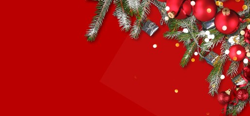 Christmas banner with fir branches, lights and new year decorations.