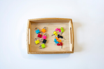 Montessori material for the study of color. Development of fine motor skills in a child.
