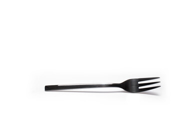 Closeup dessert cake fork isolated white background