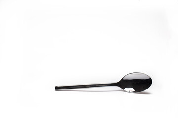 Closeup small dessert coffee spoon white background