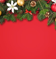Christmas banner with fir branches and decorations on desk background.