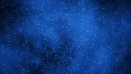 Beautiful snow falling on an abstract blue sky background. Winter holiday concept.
