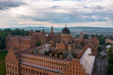 Obraz premium Aerial view of the Residence of Bukovinian and Dalmatian Metropolitans. Chernivtsi National University from above aerial view. Chernivtsi touristic destination of Ukraine.