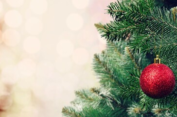 Christmas decoration. Toy balls hanging on pine branches Christmas tree garland and ornaments