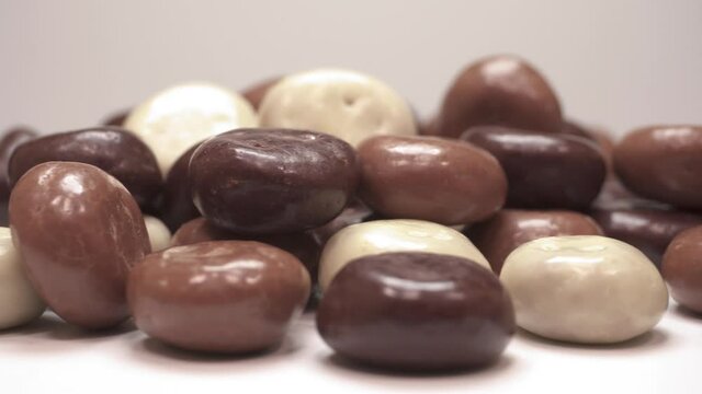 Chocolate pepernoten (kruitnoten). Shallow depth field. Loopable. Typical Dutch traditional cookies.