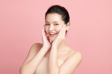 Beautiful young asian woman with clean fresh skin on pink background, Face care, Facial treatment, Cosmetology, beauty and spa, Asian women portrait.