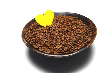 Wooden bowl with   coffee beans on white background
