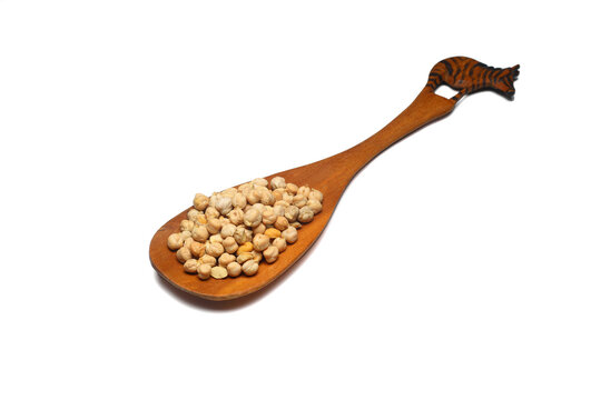 Chickpeas or Turkish peas in a wooden spoon on a white background