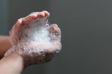 hand hold bubbles in palm with light