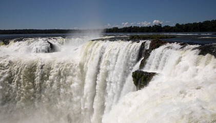 View of the waterfalls in the jungle. The precipice and falling white water. 