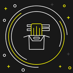 Line Asian noodles in paper box and chopsticks icon isolated on black background. Street fast food. Korean, Japanese, Chinese food. Colorful outline concept. Vector