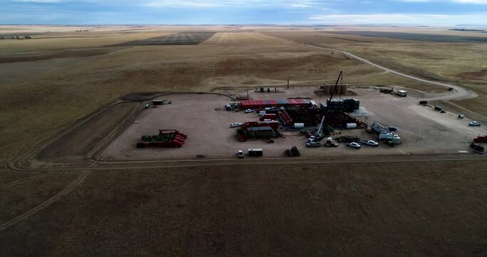 Wide Angle Dramatic Lighting Of A Fracking Oil Extraction Pad 2021 In Eastern Colorado.  Drone 4K DCI