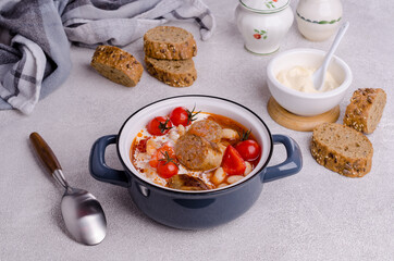 Beans soup with vegetables and sausages