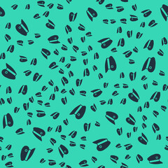 Black Train driver hat icon isolated seamless pattern on green background. Vector
