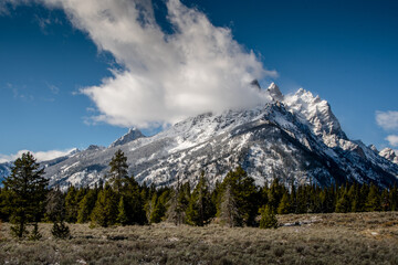 Alpine clouds in a mountain peak