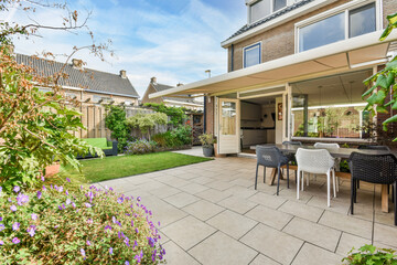 A delightful courtyard with a freshly mown lawn