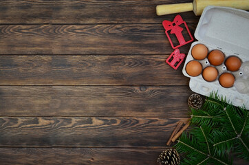 christmas baking theme with cooking festive background copy space text, eggs, ingredients, cutter dish flat lay for making recipe no people, new year culinary