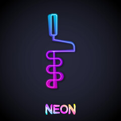 Glowing neon line Hand ice drill for winter fishing icon isolated on black background. Vector